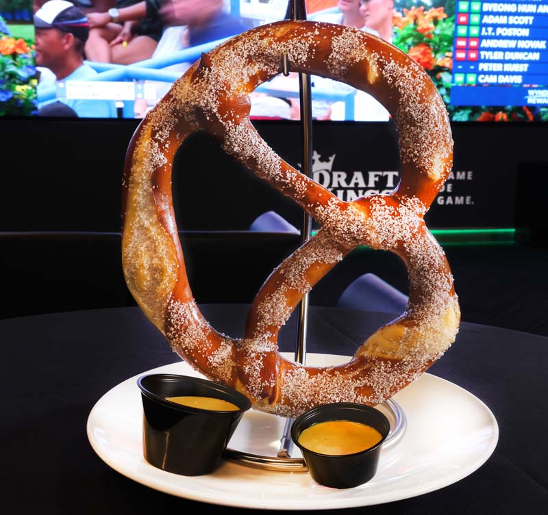 giant pretzel and cheese sauce - DraftKings Sportsbook dining at Resorts AC